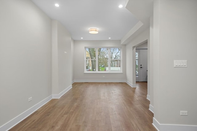 spare room featuring light hardwood / wood-style flooring