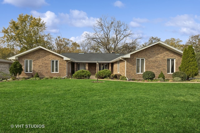 ranch-style house with a front yard