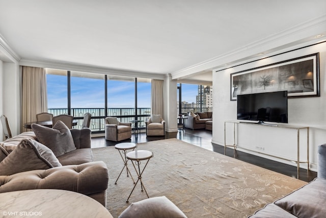 living room with a wall of windows, crown molding, and dark hardwood / wood-style flooring