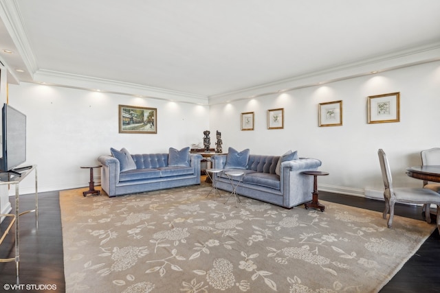 living room with ornamental molding and wood-type flooring