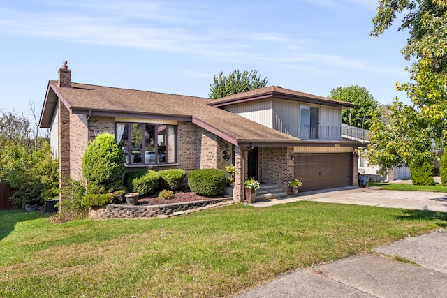 view of front of home with a garage and a front lawn