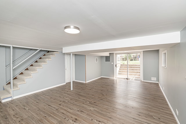 basement featuring wood-type flooring