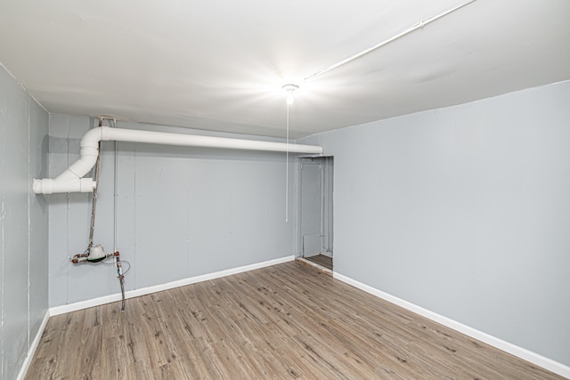 basement featuring light wood-type flooring