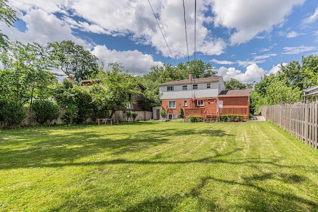 view of yard featuring a deck