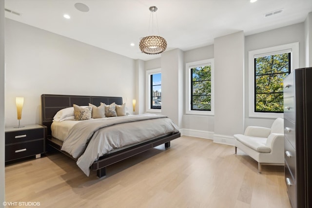 bedroom featuring light hardwood / wood-style floors