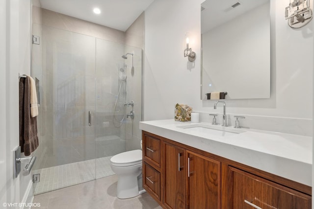 bathroom with vanity, an enclosed shower, toilet, and tile patterned flooring