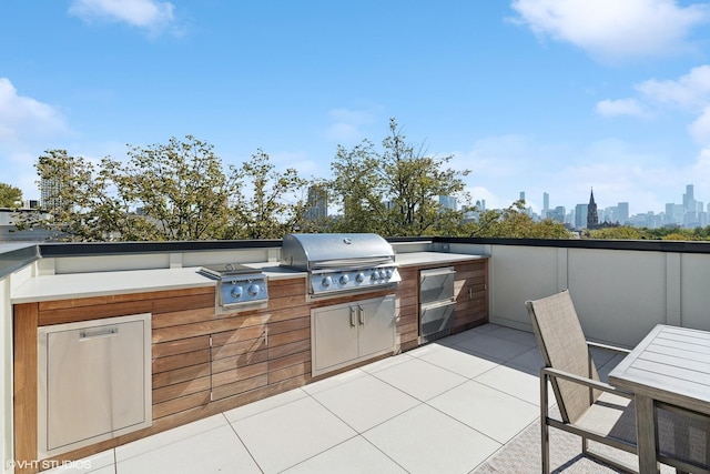 view of patio / terrace with area for grilling and an outdoor kitchen