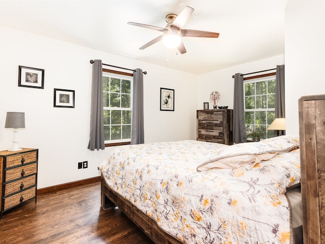 bedroom featuring ceiling fan and dark hardwood / wood-style flooring