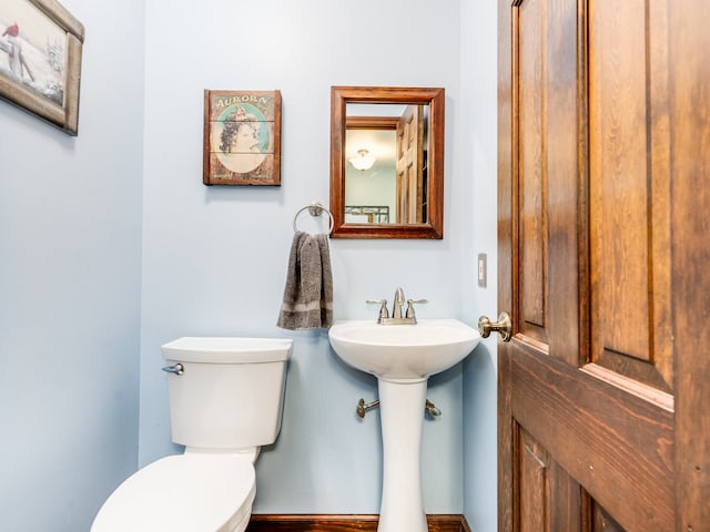 bathroom featuring toilet