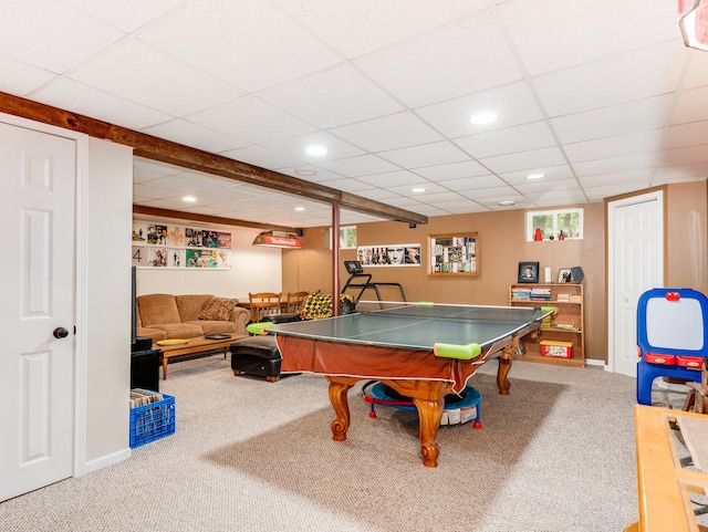 recreation room featuring carpet floors and a paneled ceiling