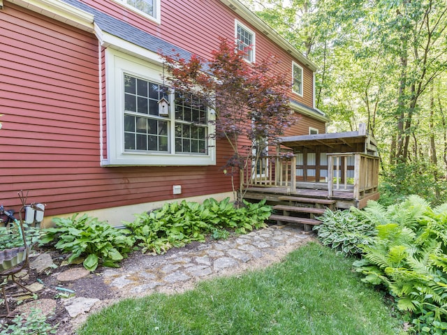 exterior space featuring a wooden deck