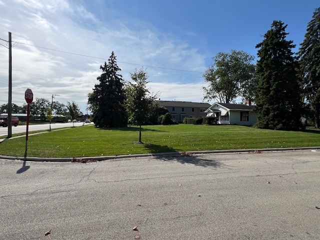 view of front of home with a front yard