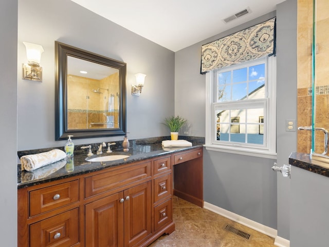 bathroom featuring tile patterned floors and vanity