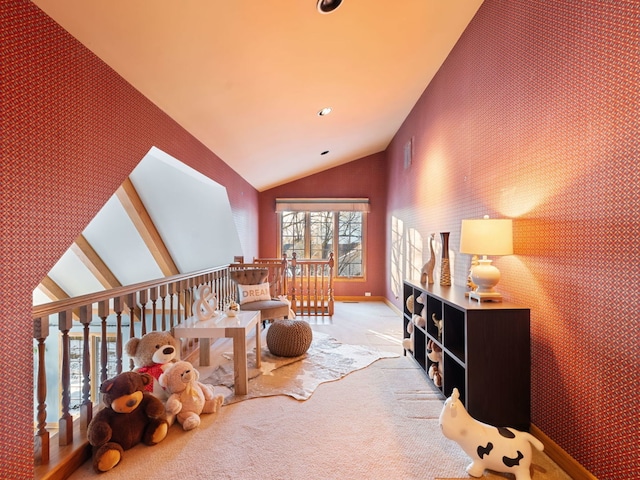 interior space featuring high vaulted ceiling and light carpet