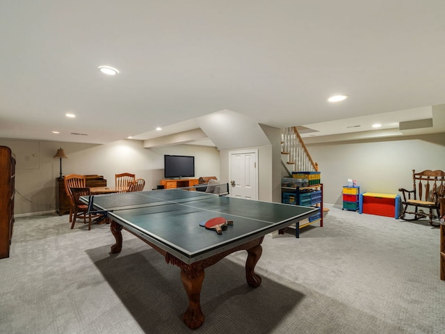 game room with light colored carpet