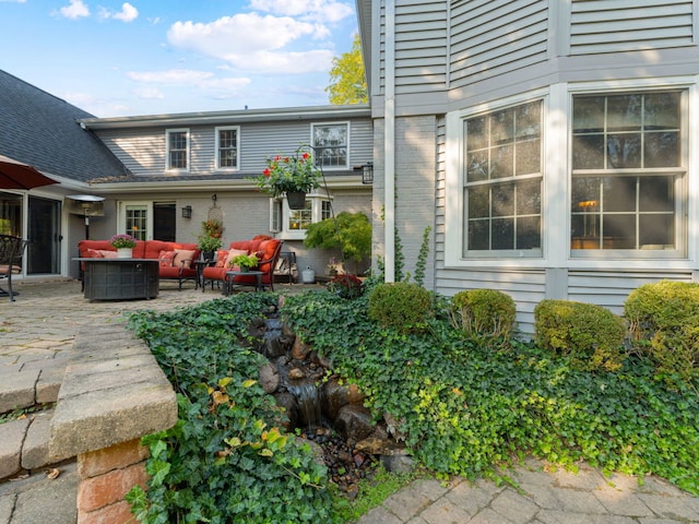 exterior space featuring a patio and an outdoor living space