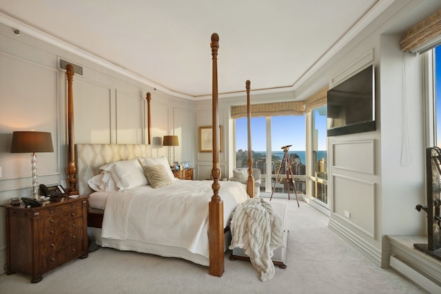 bedroom featuring carpet floors and ornamental molding