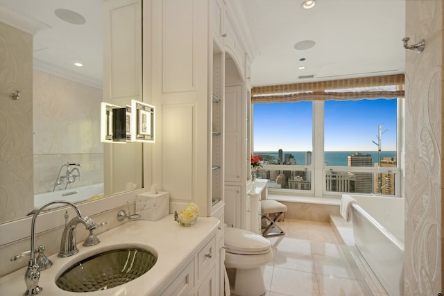 bathroom with a water view, vanity, crown molding, toilet, and tile patterned floors