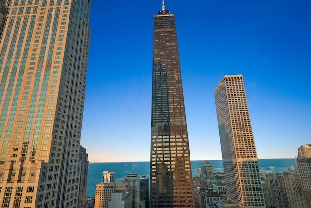 property's view of city with a water view