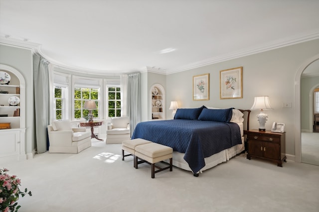 carpeted bedroom featuring ornamental molding