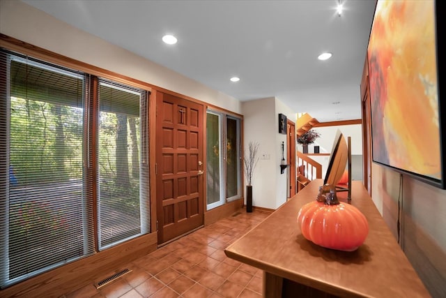 view of tiled foyer entrance