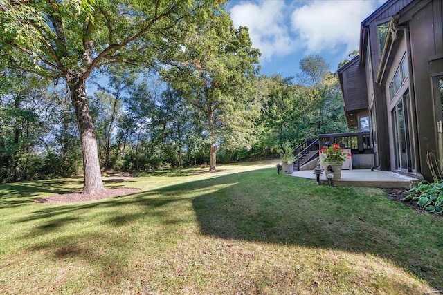 view of yard featuring a deck