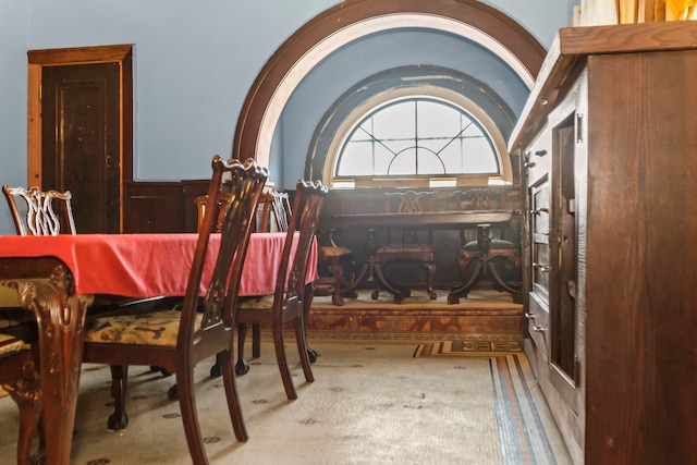 dining room featuring carpet