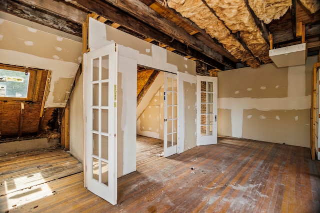 misc room featuring french doors and wood-type flooring