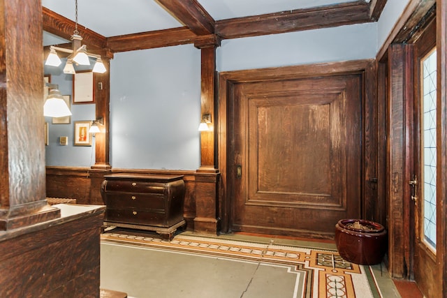 room details with ornate columns, beamed ceiling, and tile patterned flooring