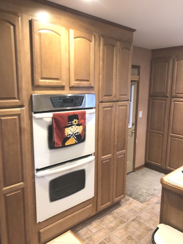 kitchen with white double oven