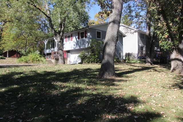 view of home's exterior featuring a yard