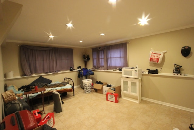 recreation room with crown molding