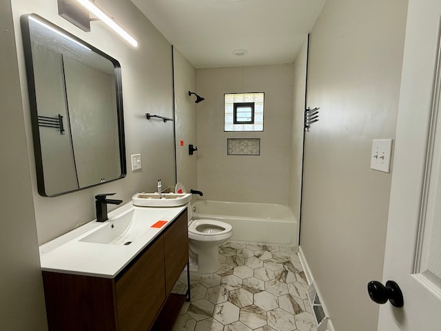 full bathroom with tiled shower / bath, vanity, toilet, and tile patterned floors