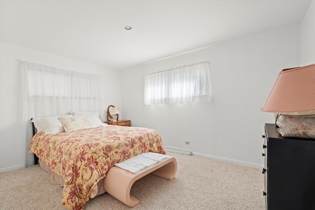 bedroom featuring a baseboard radiator and carpet flooring