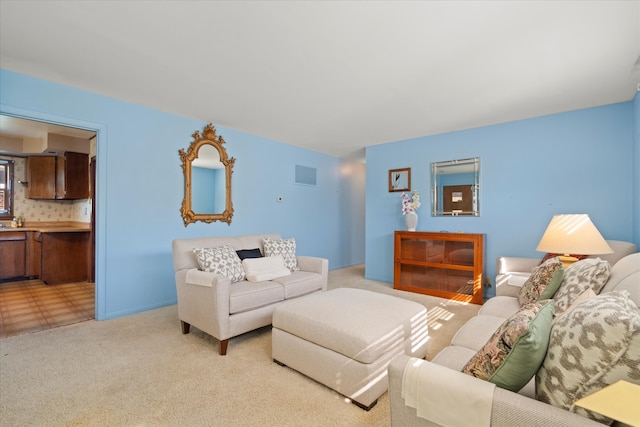 living room featuring light colored carpet