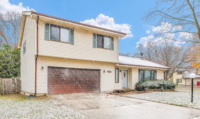 view of front of property featuring a garage