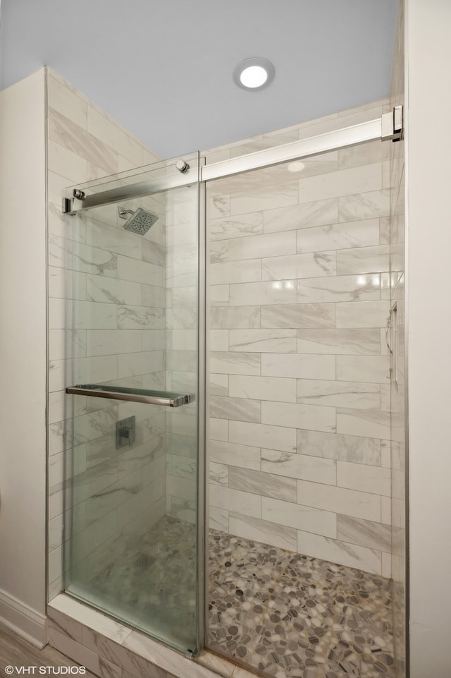 bathroom with an enclosed shower