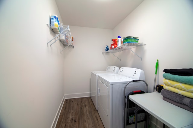 washroom featuring independent washer and dryer and dark hardwood / wood-style flooring