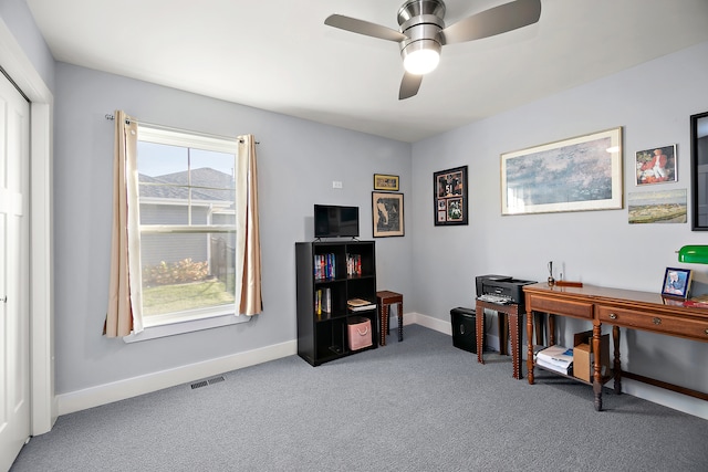 misc room featuring carpet flooring and ceiling fan