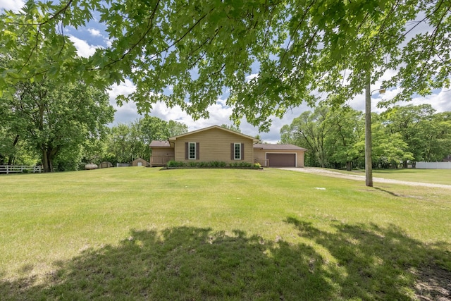 view of yard featuring a garage