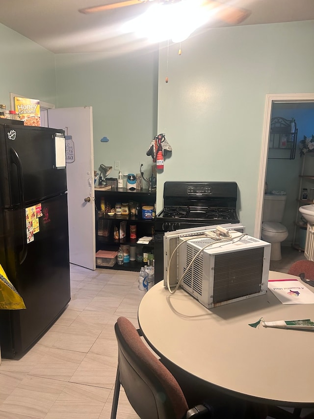 kitchen with black refrigerator