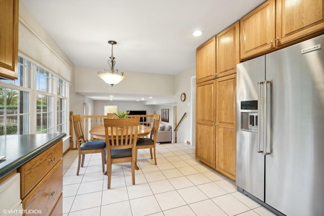 dining space with light tile patterned floors