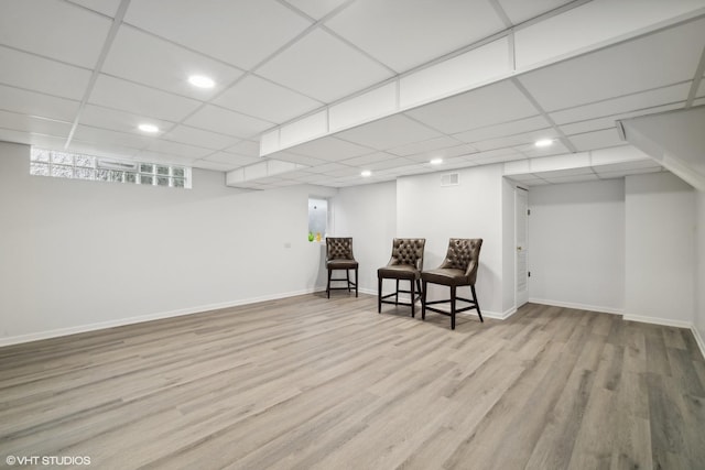 sitting room with visible vents, baseboards, recessed lighting, wood finished floors, and a paneled ceiling