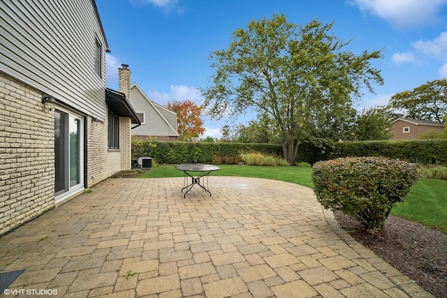 view of patio with cooling unit