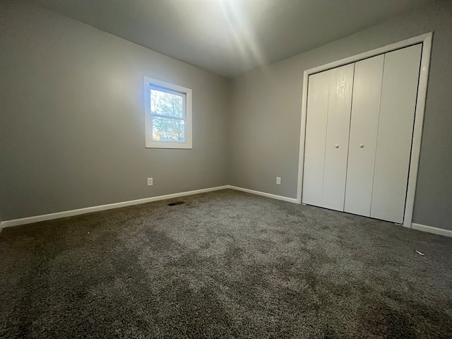 unfurnished bedroom featuring carpet floors