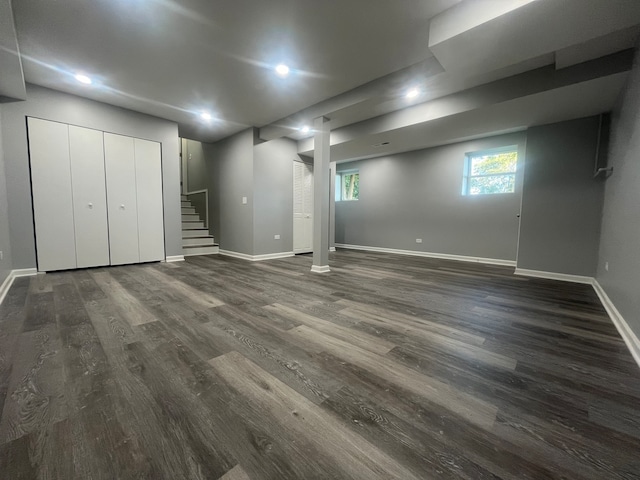 basement with dark wood-type flooring