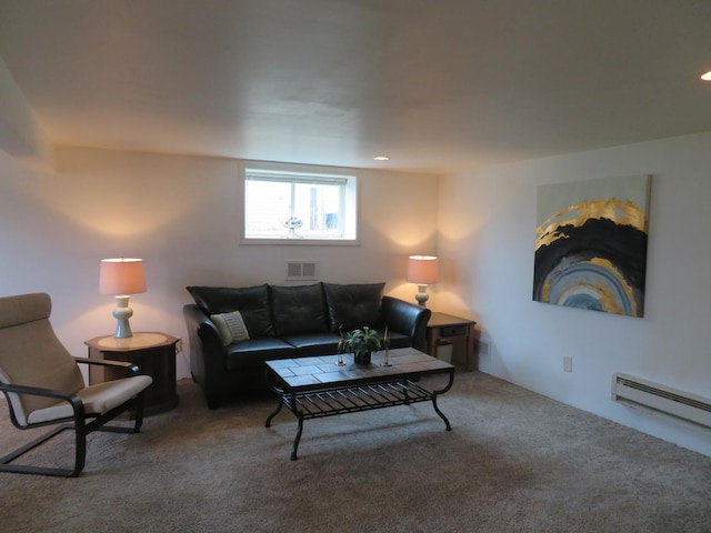 carpeted living room featuring a baseboard radiator