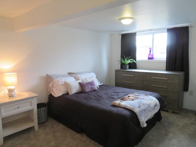 bedroom with light colored carpet