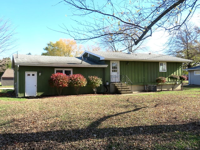 ranch-style house with central air condition unit