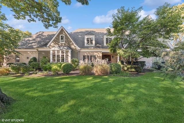 view of front of home with a front yard